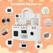 White wooden kids play kitchen set with microwave, cabinet, stove, sink, oven, steamer, washing machine, hooks, and towel rack