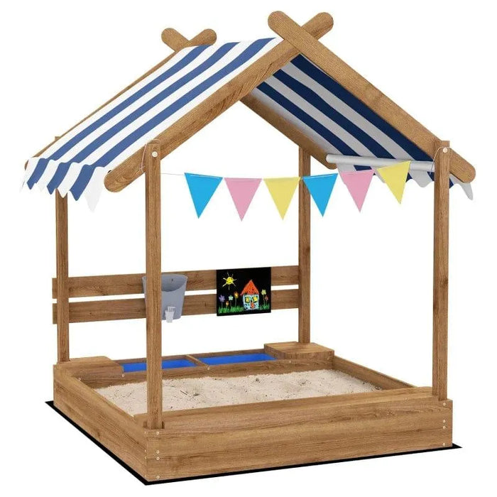 Kids wooden sandbox with house-shaped canopy, bunting, and play accessories