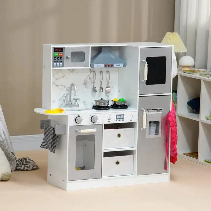White and silver kids wooden toy kitchen with chef accessories and storage compartments