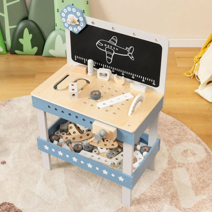 Kids wooden workbench with blue tool set, chalkboard airplane drawing, and toy clock