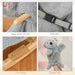 Closeup of koala rocker details: wood handle, seat belt, foot pedal, and plush koala glove doll.