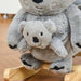 Plush koala rocker toy with interactive mother and baby design on wooden base