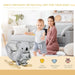 Baby and mother playing by plush koala rocker with baby koala seat in living room