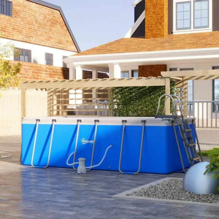 Large blue above ground steel frame swimming pool set with ladder and filter pump in yard