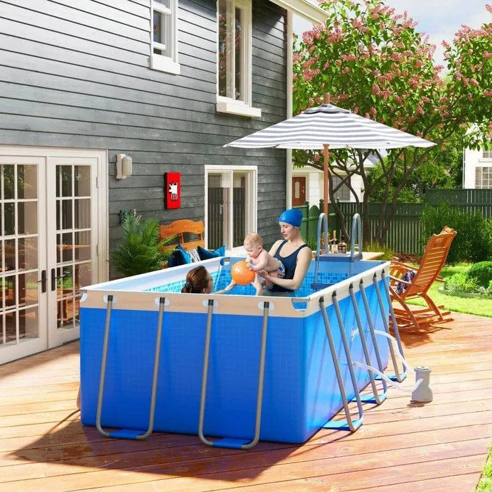 Large blue above ground steel frame swimming pool set with ladder and filter pump on patio