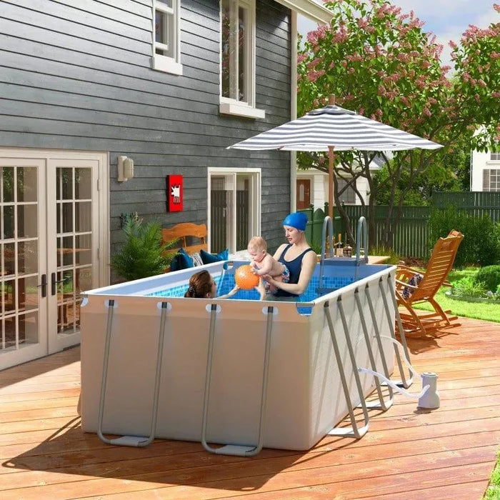 Large grey steel frame above ground swimming pool set with ladder and filter on wooden deck