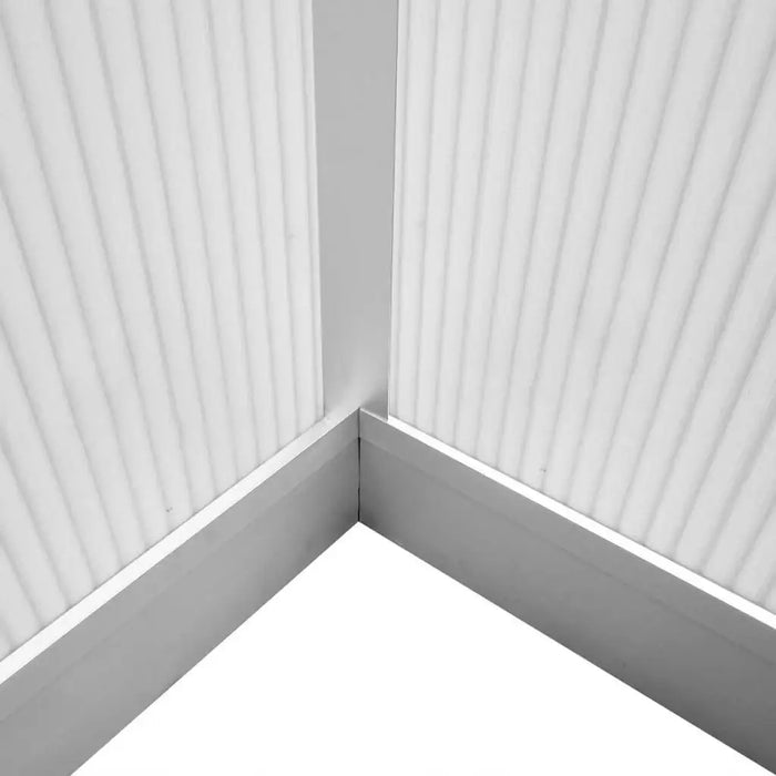 Close-up of aluminium greenhouse corner with double-walled polycarbonate panels