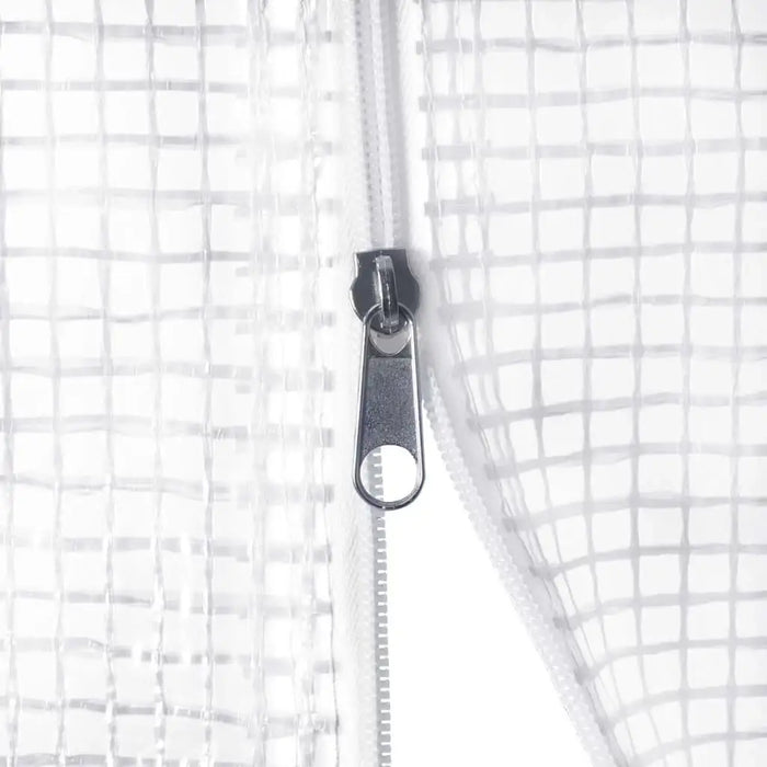 Close-up of a white mesh heavy-duty PVC zipper on a walk-in greenhouse polytunnel cover