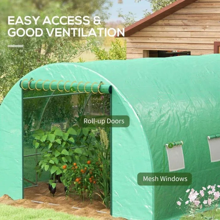 Large green walk-in polytunnel greenhouse with roll-up doors and mesh windows in a garden