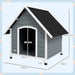 Large grey and black wooden dog kennel with slanted roof and dimensions in centimeters
