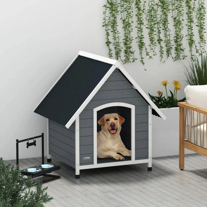 Large grey and black wooden dog kennel with slanted roof, dog inside, outdoor pet house