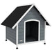 Large grey and black wooden dog kennel with slanted roof, outdoor pet house design