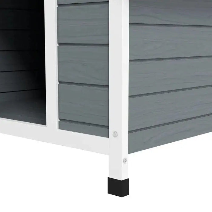 Grey wooden outdoor dog kennel with white frame and black leg cap