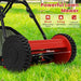 Red lawn mower on grass with features highlighted