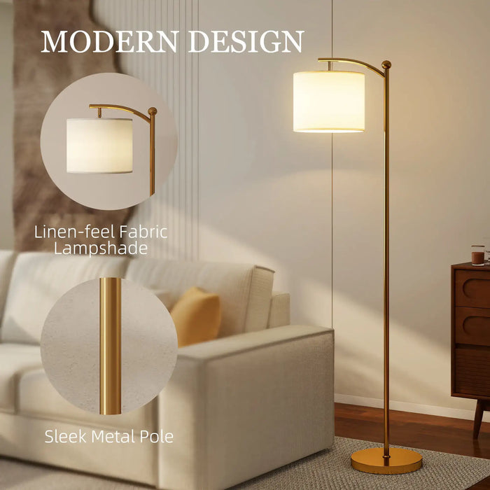 Modern gold metal floor lamp with linen fabric lampshade next to beige sofa in living room
