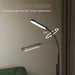 Floor lamp with gooseneck design on a neutral background