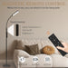 Floor lamp with remote control in a living room setting, highlighting magnetic remote control feature.