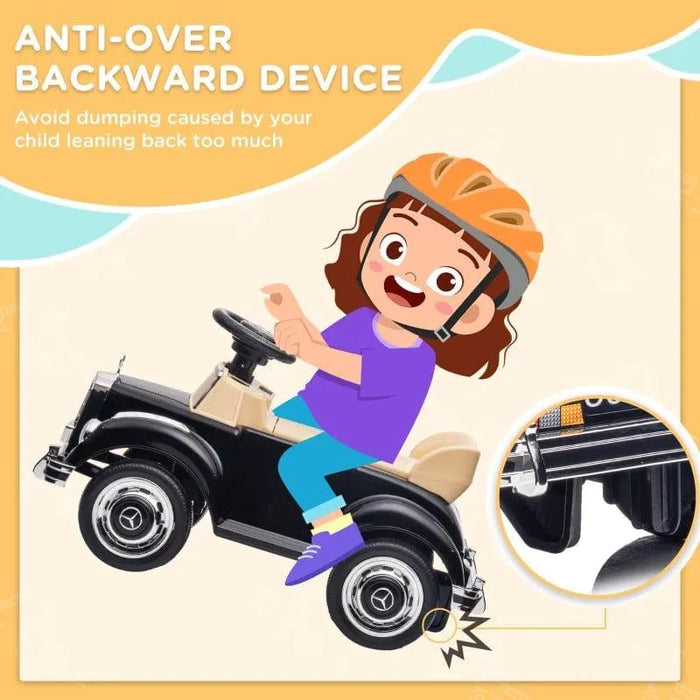 Child wearing helmet on black Mercedes-Benz 300S kids sliding car with anti-rollover device