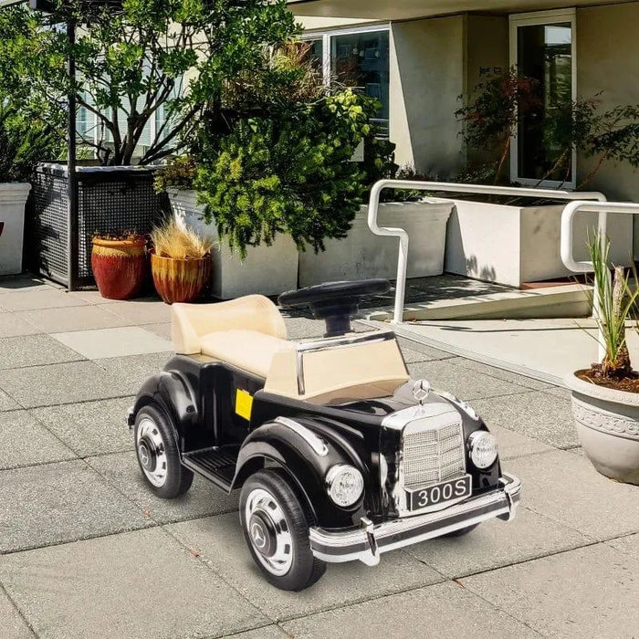 Mercedes Benz 300S kids sliding car with beige seat on modern outdoor patio