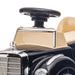 Mercedes-Benz 300S kids sliding car with steering wheel and beige seat, close-up view