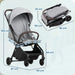 Baby stroller with dimensions on a light blue background