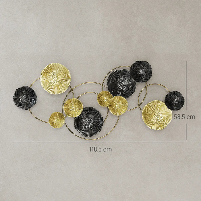 Decorative wall art with gold and black circular elements on a beige background