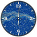 Round wall clock with blue starry sky design and white numeric hour markers