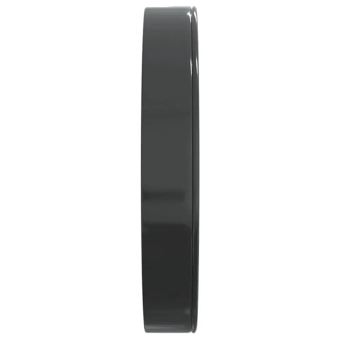 Side view of a round blue and green rustic wall clock with silent quartz movement