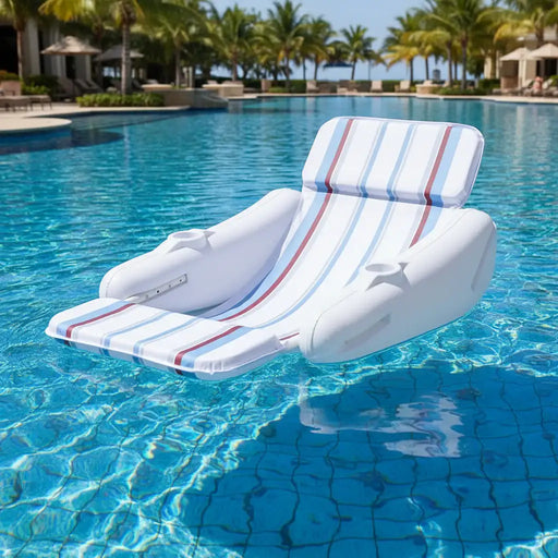Luxury inflatable pool lounger with cup holders floating in a resort swimming pool