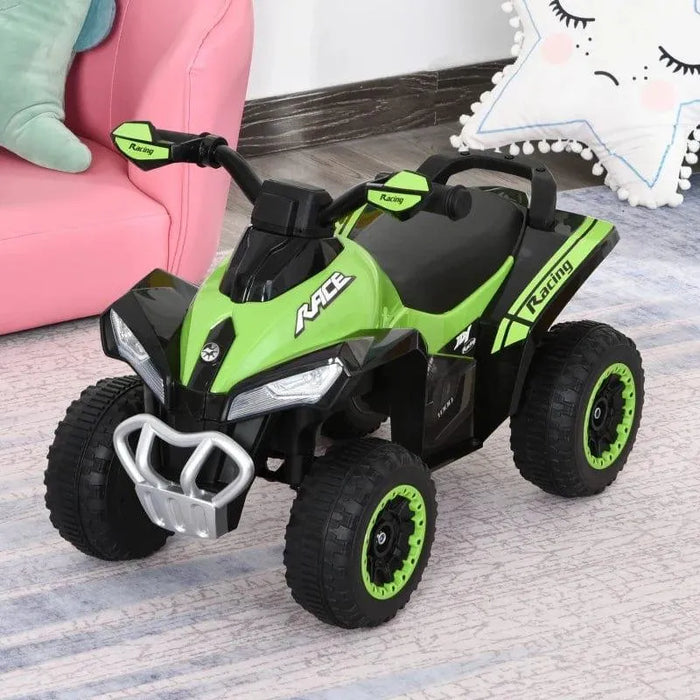 Green toddler ride-on quad bike with foot-to-floor design and racing decals indoors