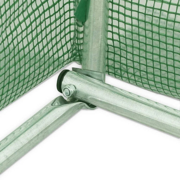 Green steel greenhouse frame with heavy-duty PE mesh cover at corner joint