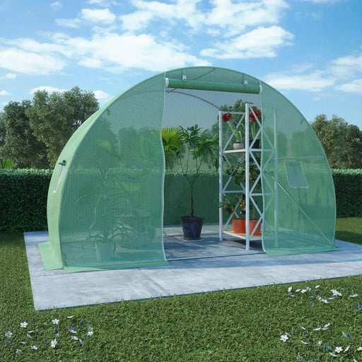Medium walk-in greenhouse with green mesh cover and potted plants in a garden setting