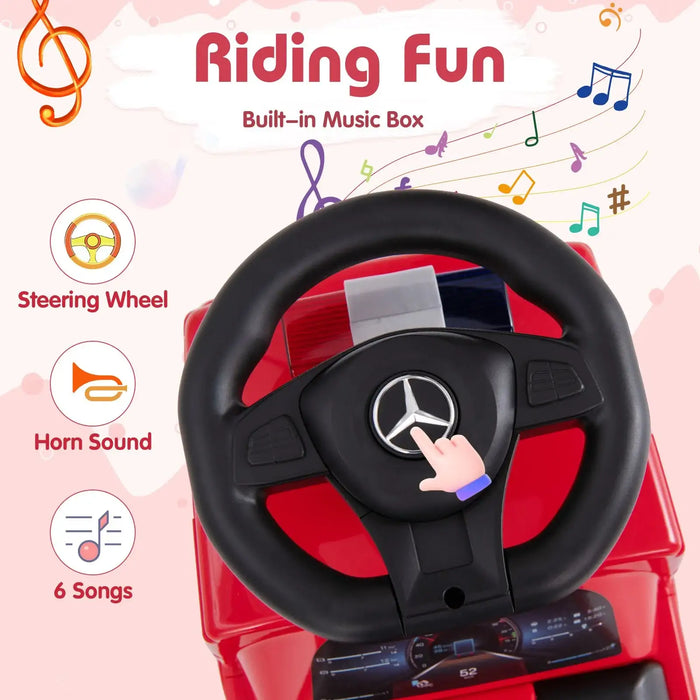 Toy steering wheel with Mercedes-Benz logo on a pink background with musical notes.