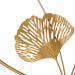 Gold leaf decorative item on a white background