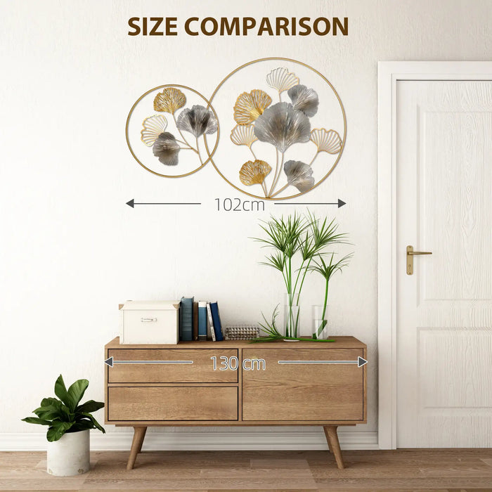 Size comparison of a decorative wall art piece with a wooden cabinet and plant.
