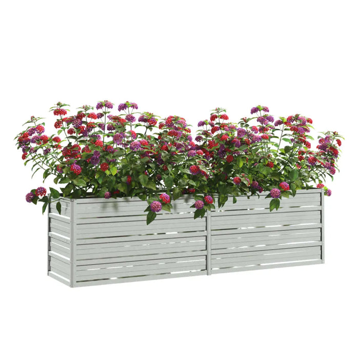 Silver galvanized steel raised garden bed with colorful blooming flowers against white background
