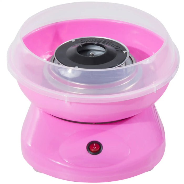 Pink cotton candy maker with clear top on a white background