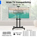 Black height-adjustable rolling TV stand with shelves supporting 32-70 inch flat or curved TVs, max 50kg load