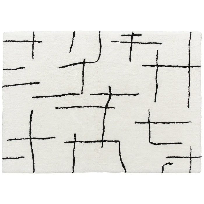 Rectangular white rug with black abstract line pattern on a white background