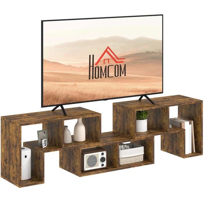 Rustic brown modular TV stand with open shelves holding decor, books, and electronics supporting large TV
