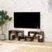 Modular rustic brown TV stand with storage shelves under wall-mounted large flat-screen TV in modern living room