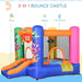 Colorful 3-in-1 monster inflatable bouncy castle with slide, basketball hoop, and trampoline.