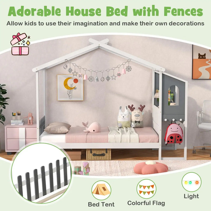 Children's bed with house design, bed tent, colorful flags, and light feature.