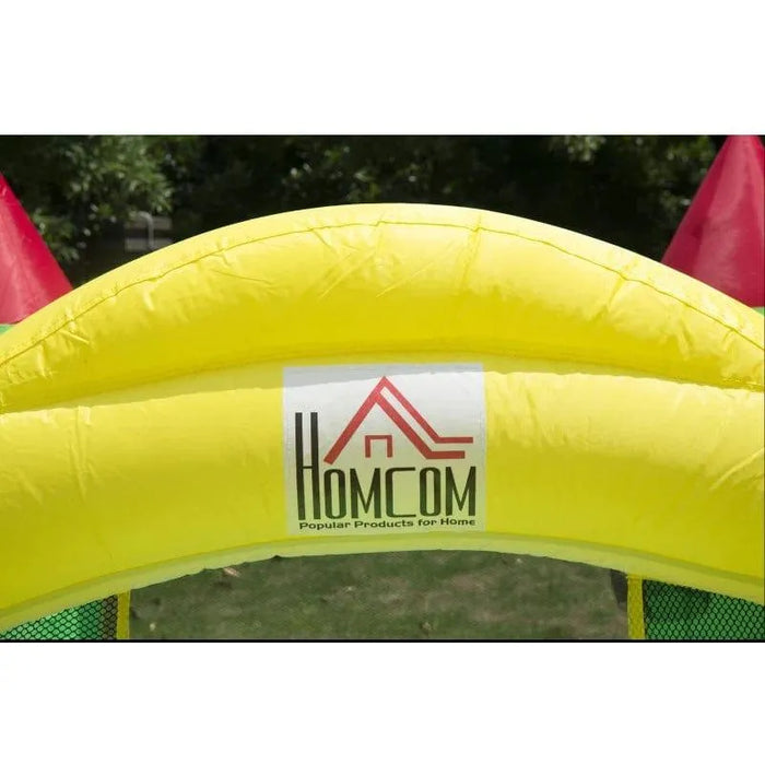 Yellow inflatable bouncy castle arch with HomCom logo outdoors