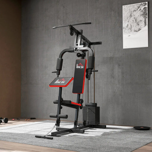 Home gym equipment with red and black design on a gray floor.