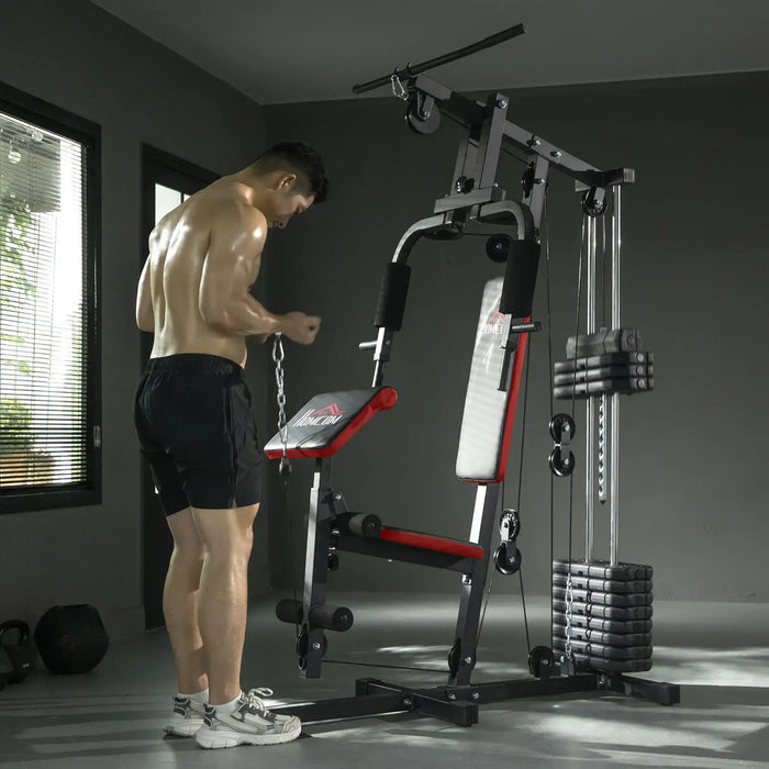 Man using a home gym machine in a room with a window.
