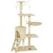 Beige multi-level cat tree with playhouse, ladder, scratching posts, hanging toy mice, and perch