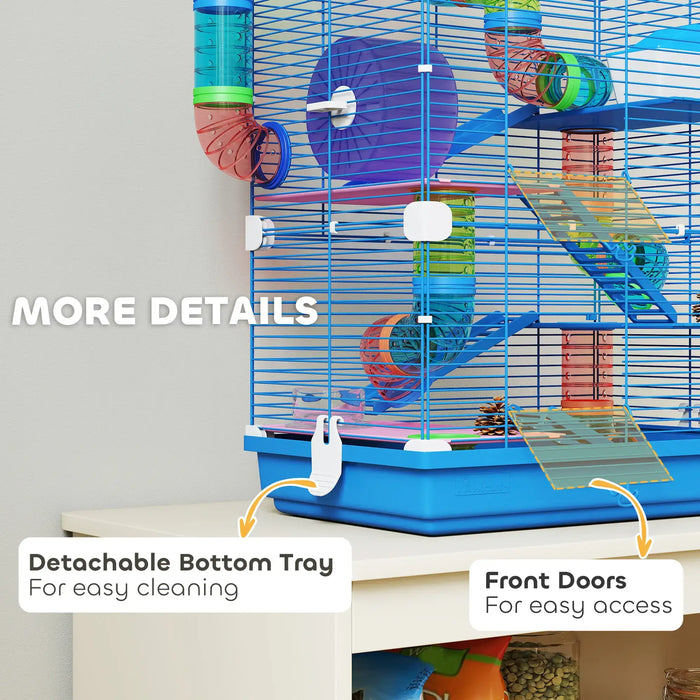 Blue multi-level small animal cage with colorful tubes, detachable bottom tray, and front doors on white table