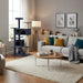 Multi-storey dark blue cat tree with sisal scratch posts in modern living room