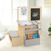 Children's art desk with drawing materials and storage shelves in a bedroom setting